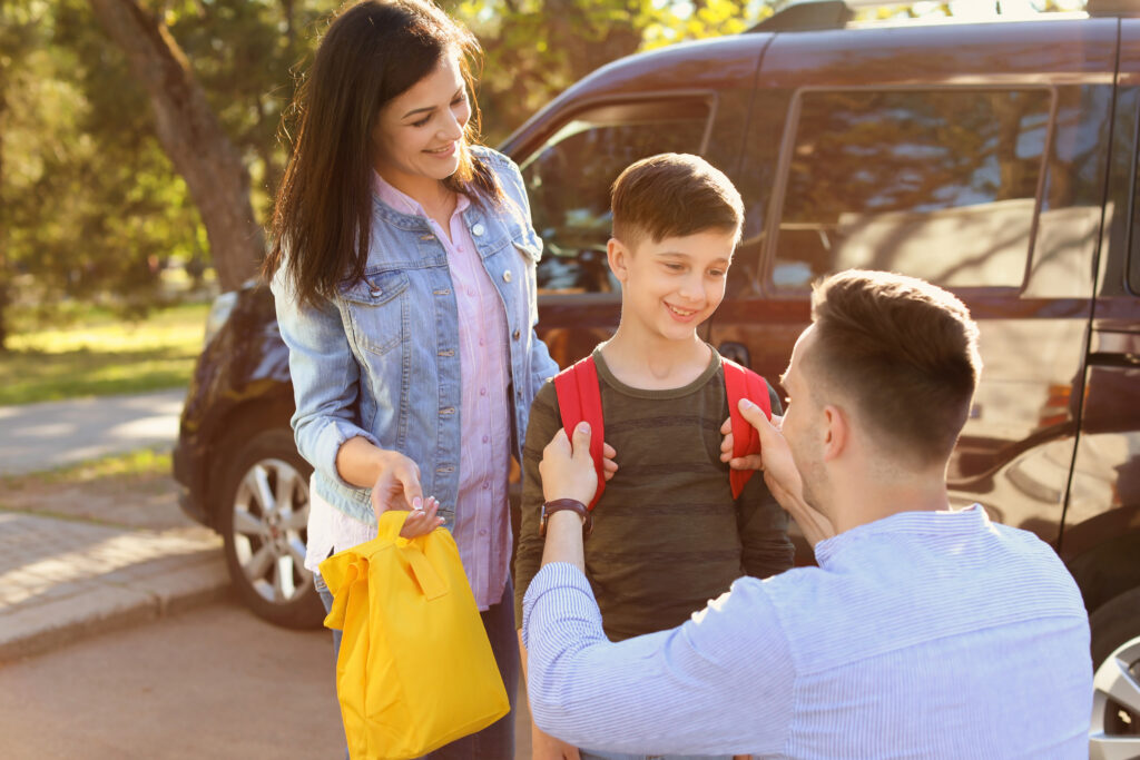 Parents getting their child ready for back-to-school driving in Amherstburg Ontario